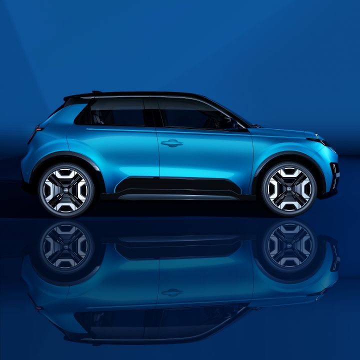 All New Nissan Micra design NDE image - profile view in gear blue body color reflecting on floor
