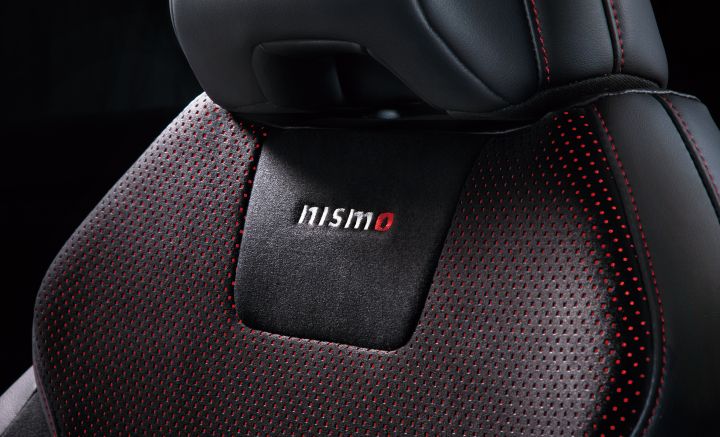 Close up shot of Ariya NISMO seat with the Nismo logo in focus