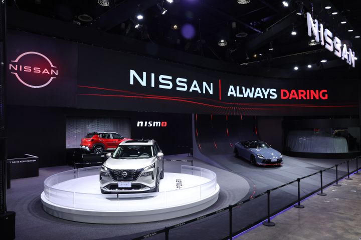 A car showroom with cars on display