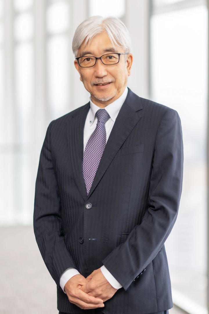Portrait of Mitsuro Antoku (suit, tie and NISSAN corporate pin)