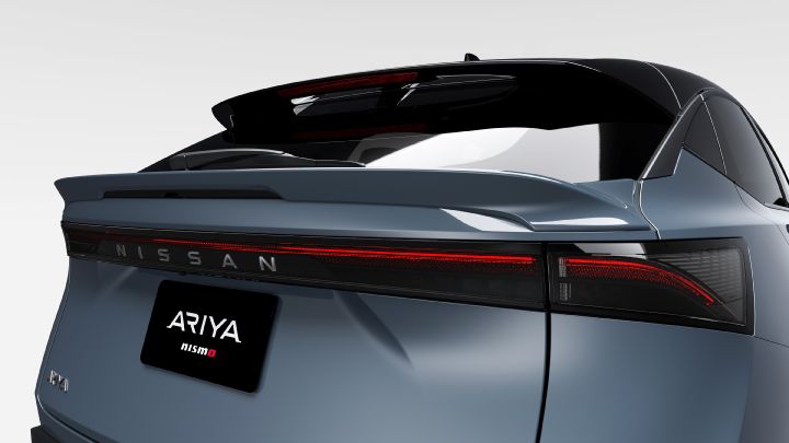 Static shot of Ariya NISMO taken from the back (rear spoiler) with Ariya Nismo written on the plates