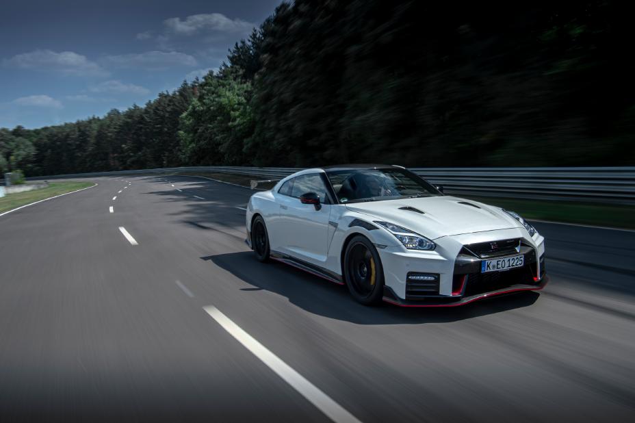 Front right side view of the GT-R NISMO driving on the road.