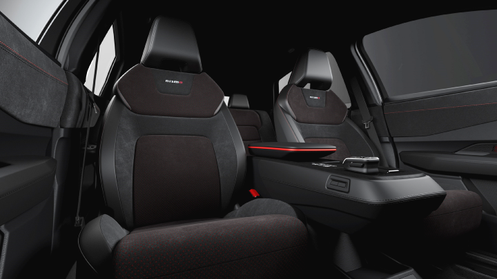 Interior of the Ariya NISMO, showing the seats with the NISMO logo on them