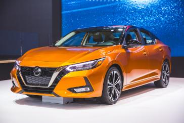 The 2020 Sentra on stage at an auto show