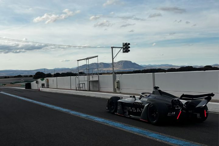 Rear shot of Zane Maloney driving the Nissan Formula E Team GEN4 car down the pit-lane at a test.