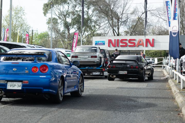 The rear view of an R34 and R32 driving into Ferntree Gully Nissan.