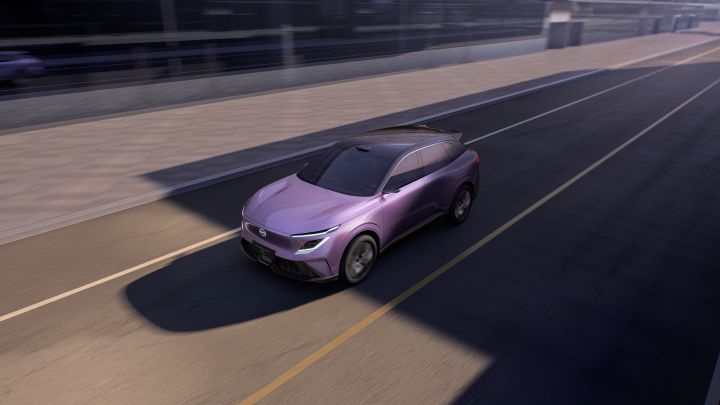 An Urban SUV PHEV Concept driving on a city road. The purple-toned SUV is viewed from an elevated three-quarter angle, moving to the left, with buildings and roadway visible around it.