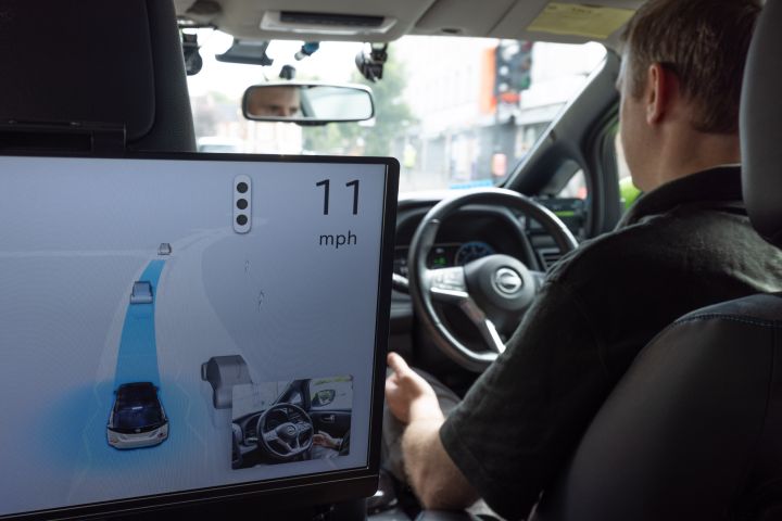 Interior static Shot of evolvAD back seat with automated screen