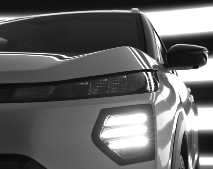 Imagem do novo Nissan Kait que mostra parcialmente a frente do veículo