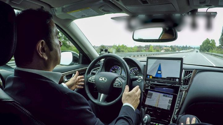 Carlos Ghosn at the wheel in autonomous-drive car