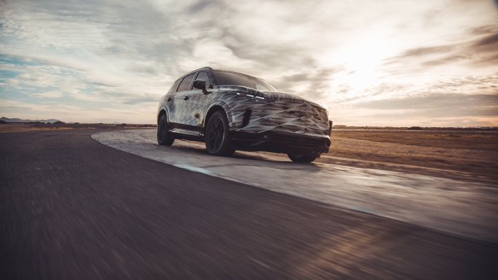 The All-new 2022 INFINITI QX60 right profile view on the road