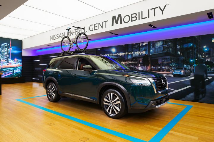 Nissan Pathfinder in the studio with a bike attached.