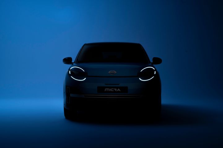 teaser image of All new Nissan Micra in the dark with only led signature headlamps in front on