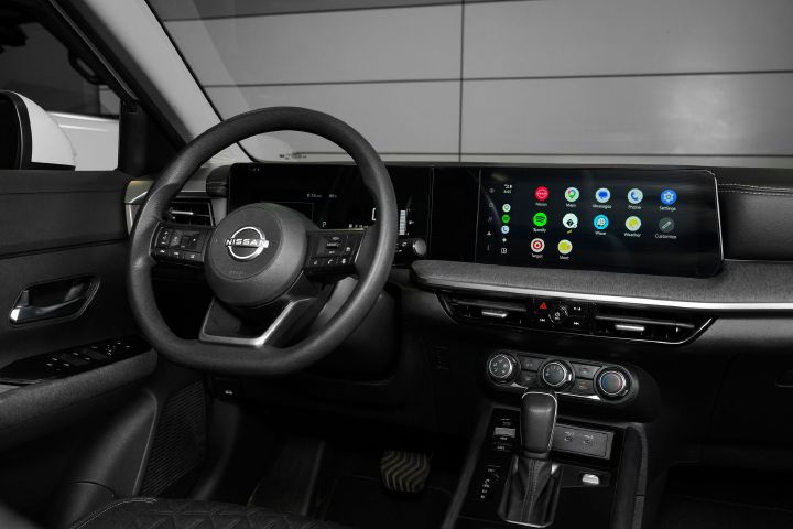 The steering wheel and dashboard display inside the 2026 Nissan Kicks.