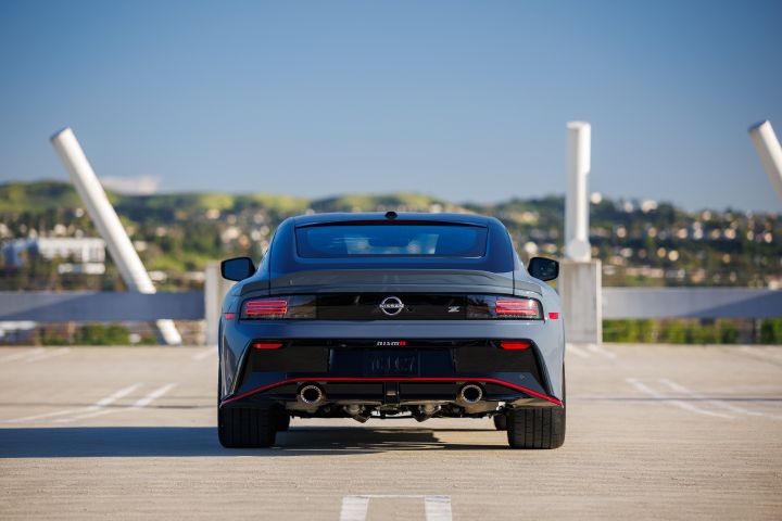Rear view of the 2027 Nissan Z NISMO MT parking in a parking lot.