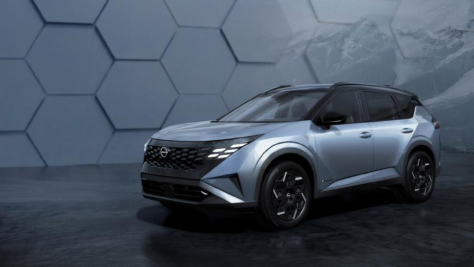 One Nissan Rogue Hybrid e-POWER on ¾ view in front of a backdrop that looks to have mountains and tiles.