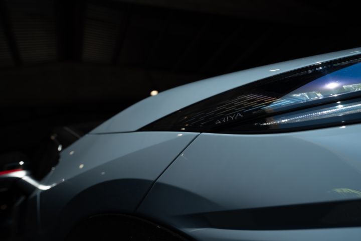Close-up shot of the right headlight of the Ariya NISMO