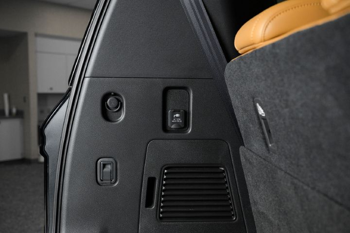 The trunk clip, storage and outlet areas inside the 2026 Nissan Armada.