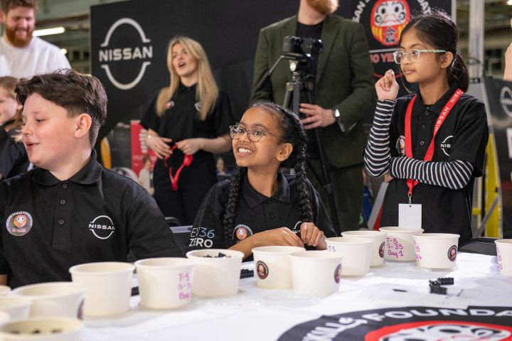 Three kids participating in the Nissan Skills Foundation Lego event