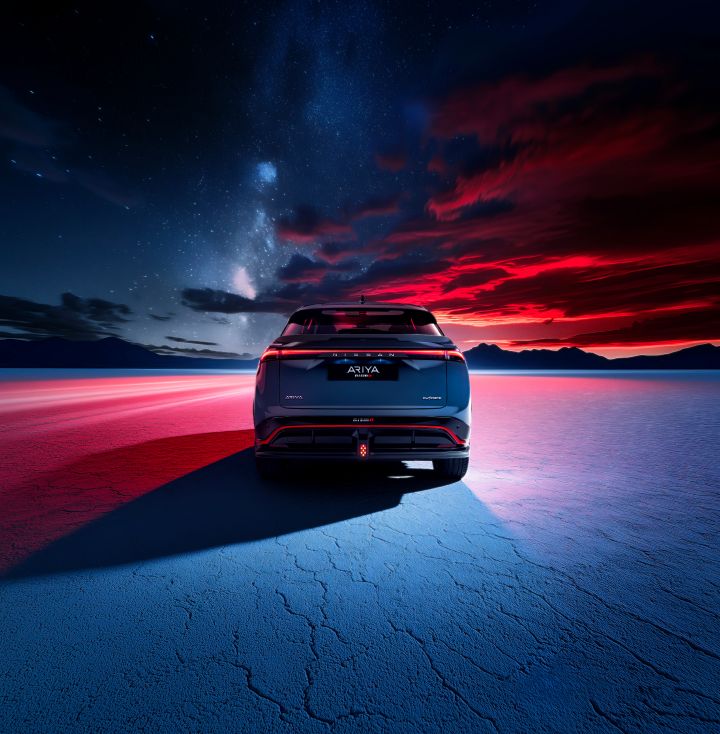 Rear static shot of the Ariya NISMO with the red warning light