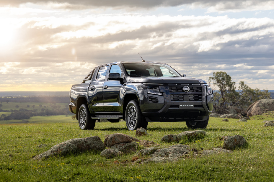 Static front ¾ exterior image of a Summer Silver 2026 Nissan Navara ST-X dual cab 4x4