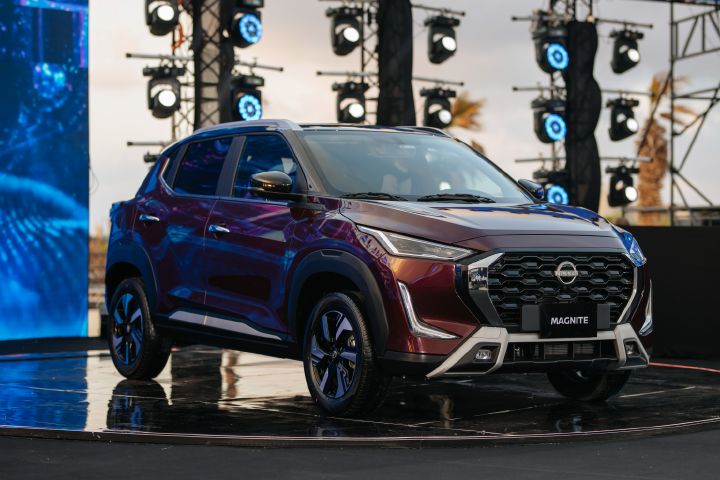 The Nissan Magnite on stage at an event.