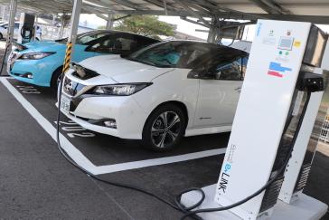 A trial using Nissan LEAF electric cars to help power office buildings has proved successful in cutting energy costs and CO2 emissions.