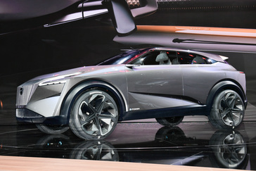 Driver side profile view of the Nissan IMQ concept on stage