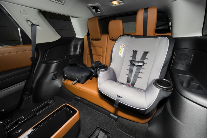 Two child safety seats attached to the third row seats inside the 2026 Nissan Pathfinder.