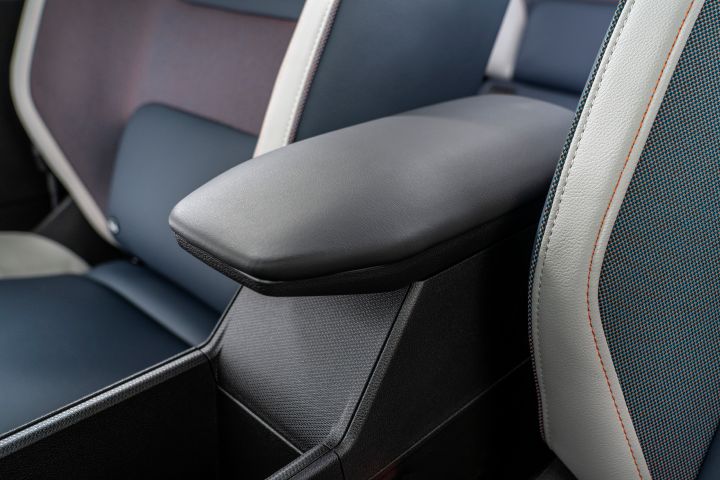 detailed view of front seat materials and center storage console