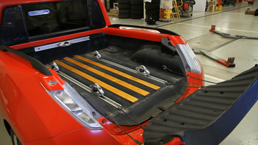 STANFIELD, Ariz. (Sept. 18, 2014) – If necessity is the mother of invention, engineers fuel that fire at Nissan’s Technical Center in Stanfield, Arizona. Here engineers are plentiful. They love to build things, test things and tinker with things. This team thinks a lot about “why not?” Recently they created a one-of-a-kind electric vehicle to haul supplies and people around on the tech center property. This is Sparky, as he’s known around the campus. It is a Nissan LEAF crossed with a Nissan Frontier, brought to life by Nissan’s Roland Schellenberg and Arnold Moulinet. 