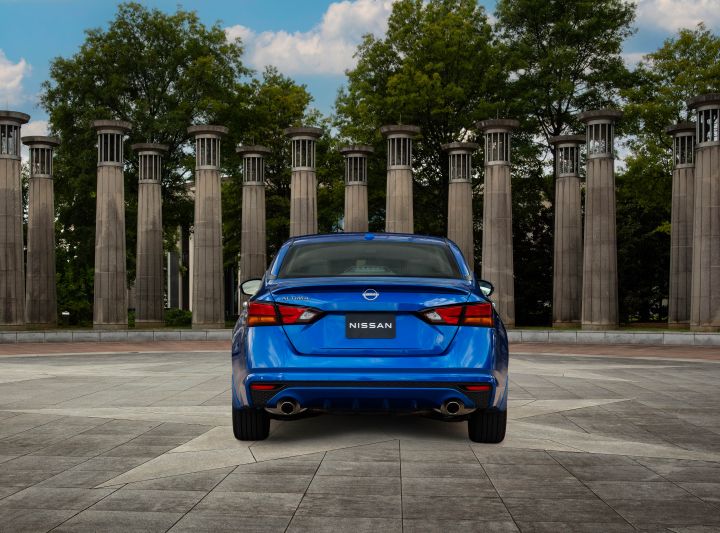 Rear profile shot of the 2024 Altima SV Special Edition in front of columns