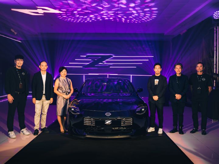 Nissan executives and representatives pose alongside the Nissan Z Heritage Edition in Midnight Purple during the unveiling ceremony at Nissan Z Fest 2026 in Brunei.