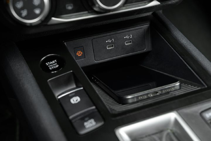 Close up of the wirleless phone charging station inside the 2026 Nissan Kicks.