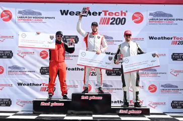 Alexandre Fortin (1st), Simon Vincent (2nd) and Nicolas Miron (3rd) on the podium