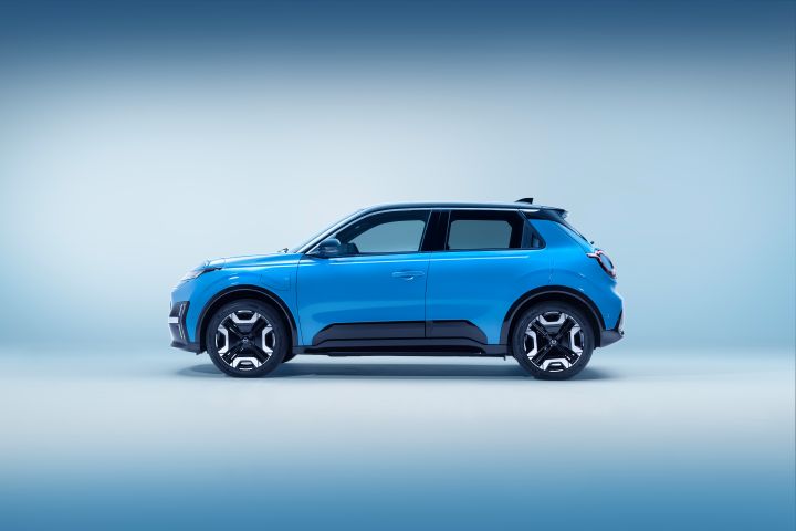 side profile view of All new Nissan Micra in gear blue body color and black roof