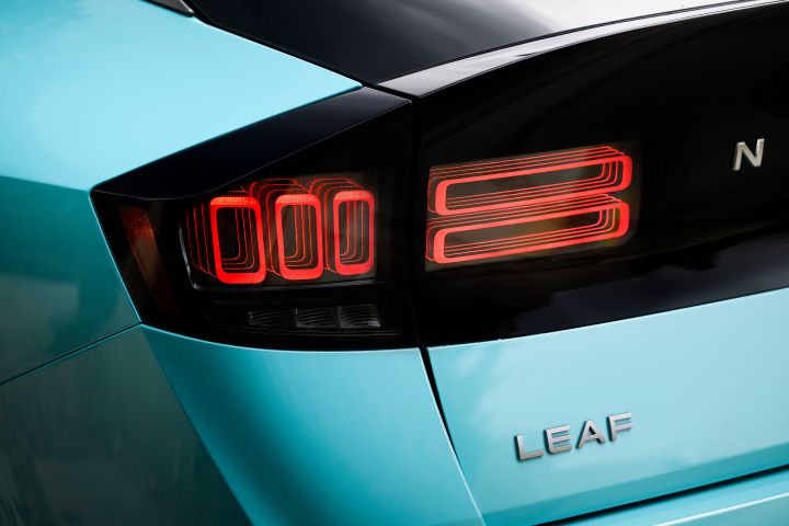 Close up of the taillights on the rear end of the 2026 Nissan LEAF, they are illuminated.