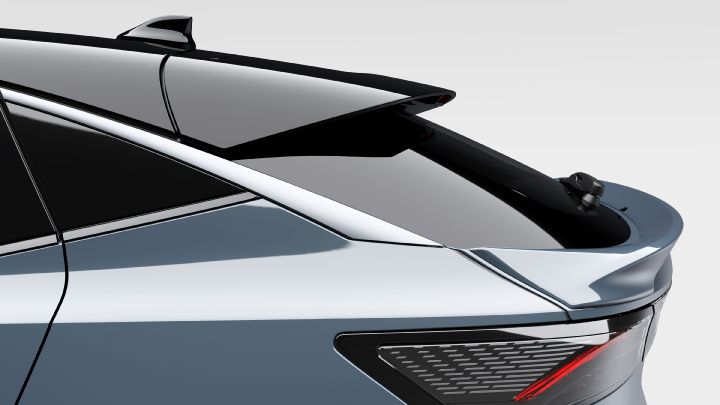 Image shows rear spoiler of Ariya NISMO with a shark antenna on the roof