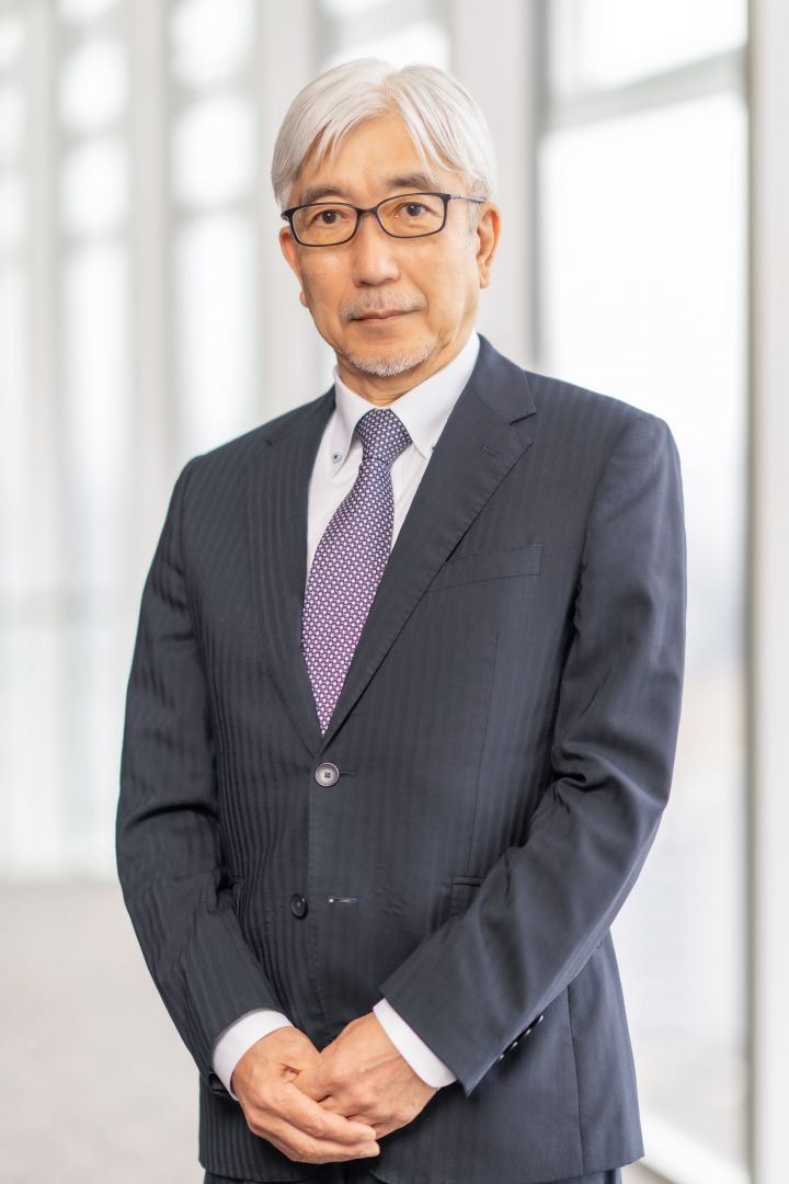Portrait of Mitsuro Antoku (suit, tie and NISSAN corporate pin)