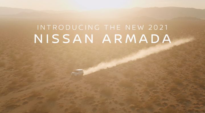 An image with a car driving down a dirt road with the words "Introducing the new 2021 Nissan Armada"