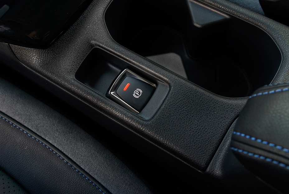 A photo of the Parking brake button in the 2019 Nissan LEAF PLUS