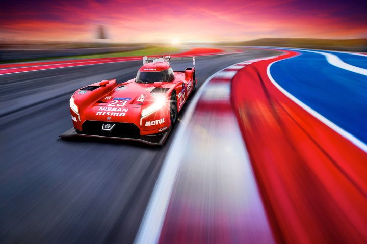 Nissan GT‑R LM NISMO racing on track facing forward