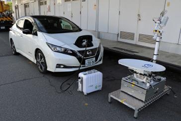 A trial using Nissan LEAF electric cars to help power office buildings has proved successful in cutting energy costs and CO2 emissions.