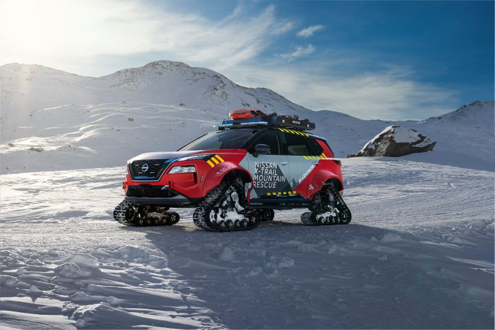 Nissan X‑Trail Mountain Rescue facing left with shadow on snowy ground