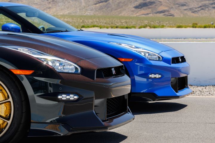 Close-up of the front of two Nissan 2024 GT‑R Special Editions on a race track