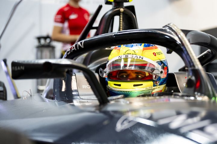 Oliver Rowland inside Nissan Formula E car at Tokyo E-Prix