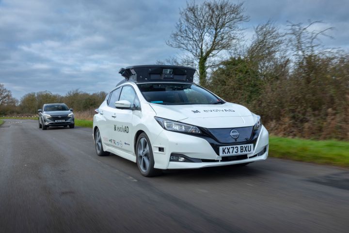 Front dynamic ¾ angle shot of evolvAD on countryside roads