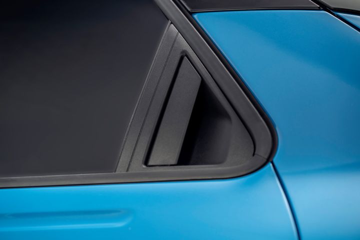 side detail of Micra's rear passenger window and door handle