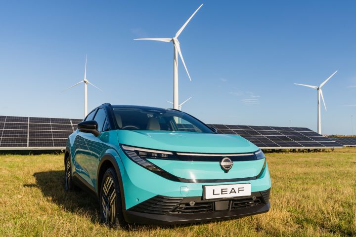 All-New Nissan LEAF in front of wind and solar farm at Nissan Sunderland Plant