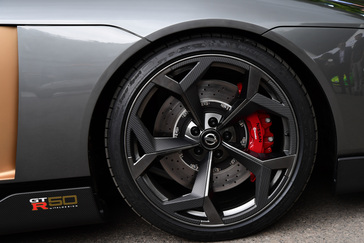 A close up of the rim and tire on the Nissan GT-R50